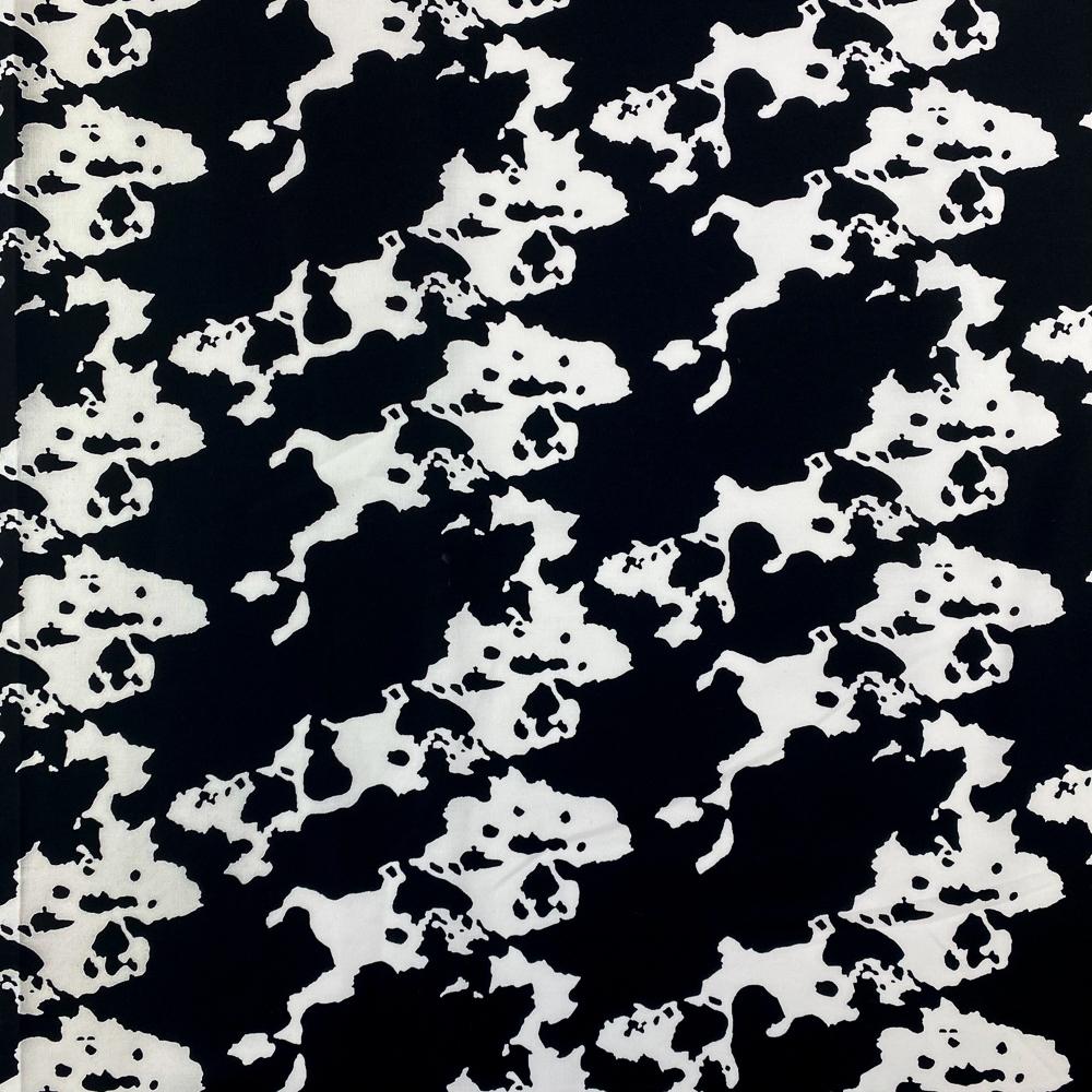 Cow print ribbon in black and white printed on 7/8 white satin