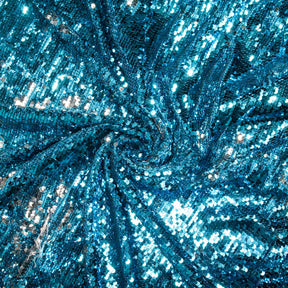 Two-Sided Reversible Sequins on Stretch Mesh